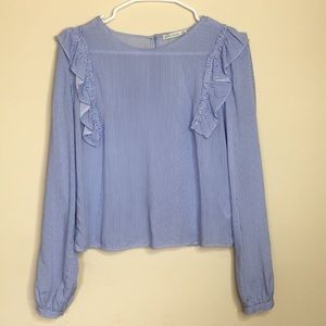 Selling a ruffled, blue and white striped shirt!